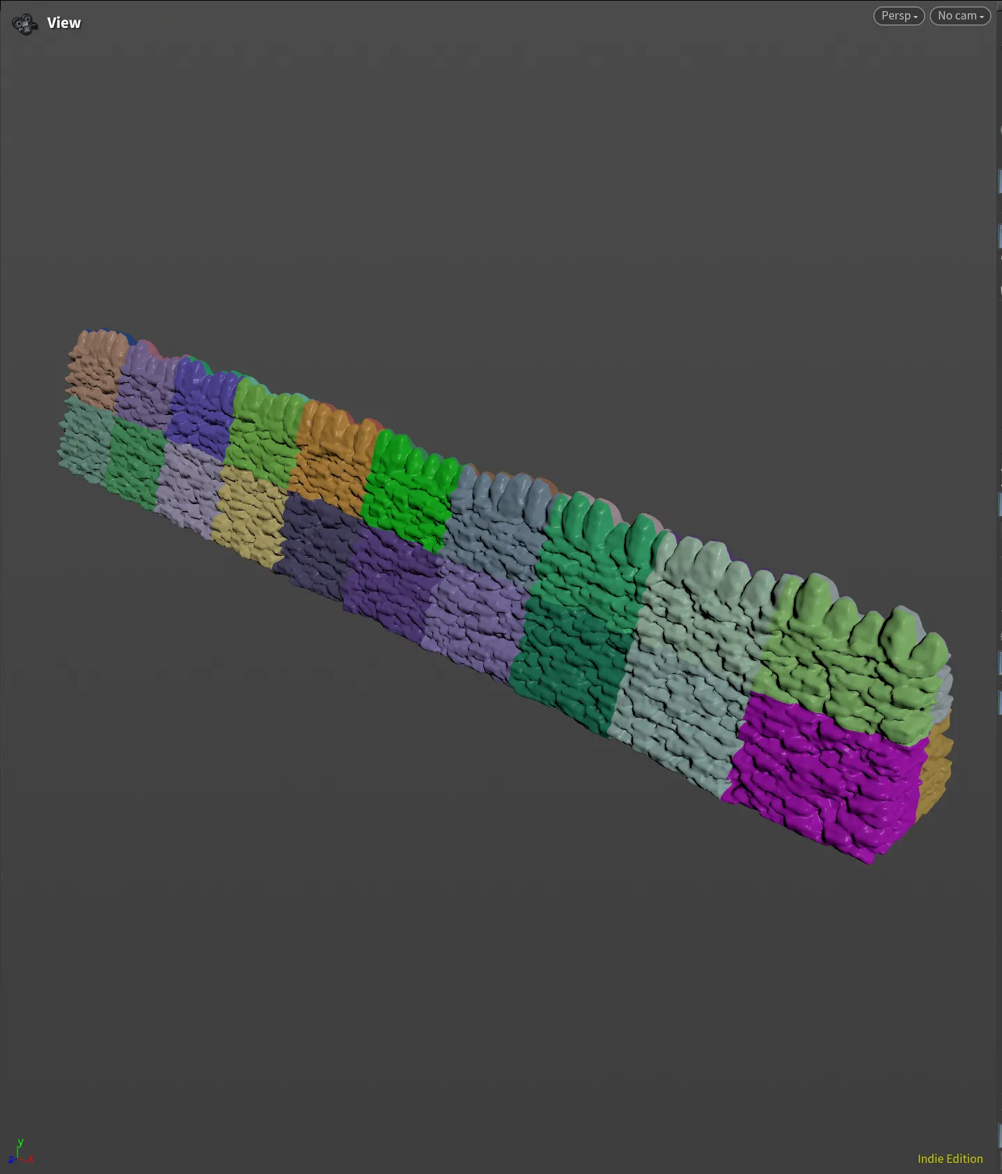 Houdini viewport showing a dry-stone wall divided into coloured connectivity groups.