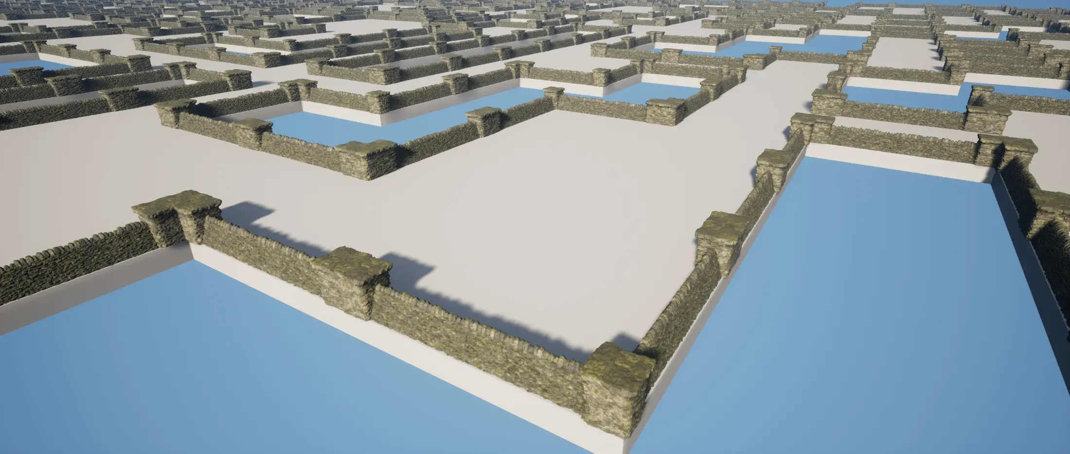 Unreal Engine preview of a large blockout maze assembled from dry-stone walls and corner pillars.